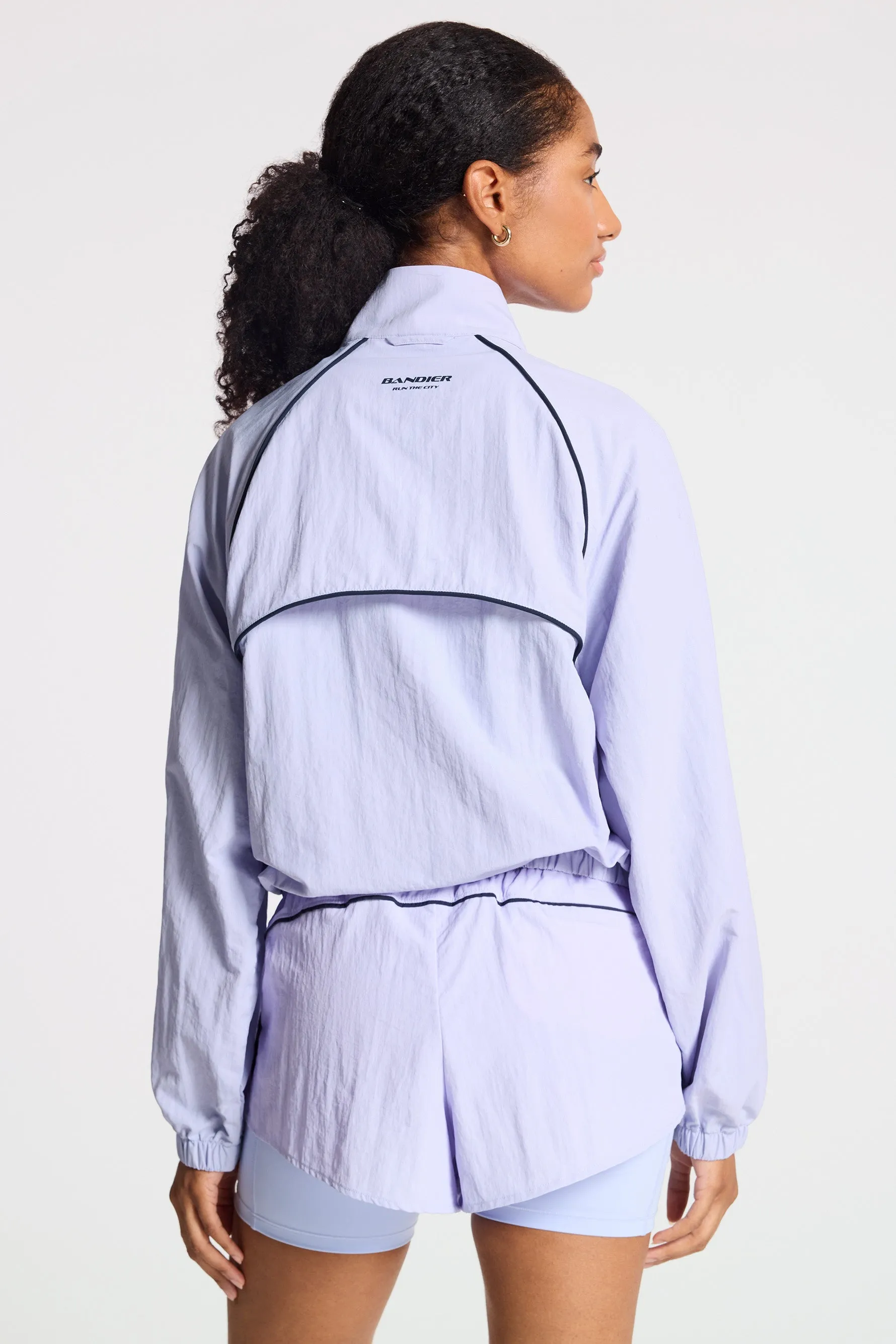 Bandier | Contrast Run Jacket | Baby Lavender/Navy Blazer
