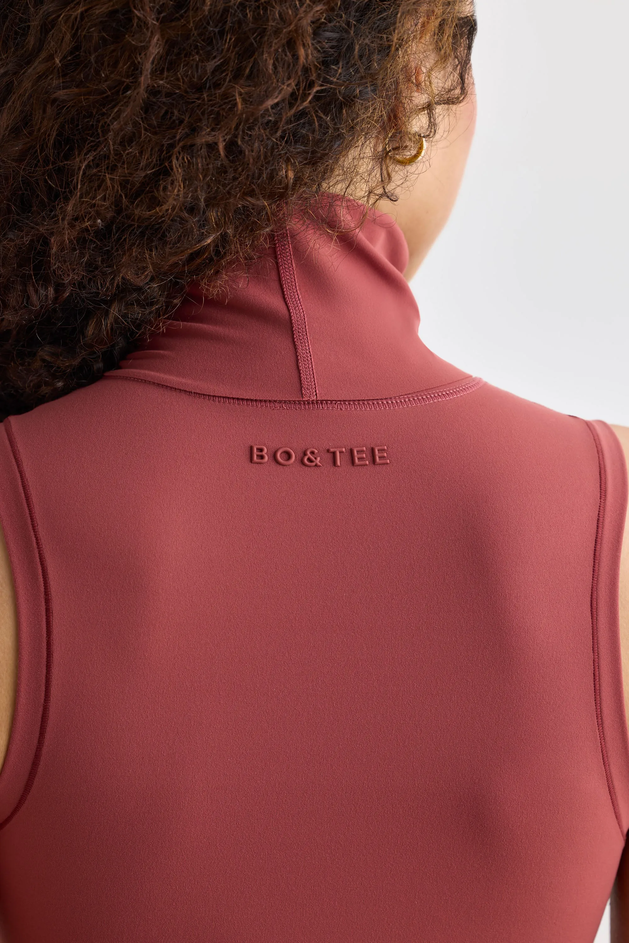 Immaculate - Soft Active Turtleneck Tank Top in Rust